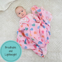 LollyBanks baby blanket muslin soft folded demonstrates cozy cuddles.