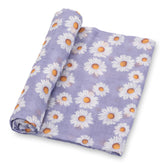 LollyBanks Daisy Garden swaddle blanket close-up shows soft cotton muslin for gentle cuddles.