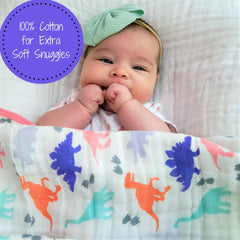 LollyBanks Dino Quilt baby in crib illustrating warmth and cozy snuggles.