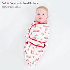 LollyBanks dog-print swaddle closeup fabric highlights 100% organic cotton texture