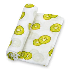 LollyBanks Kiwi print swaddle blanket in a nursery, offering cozy warmth.