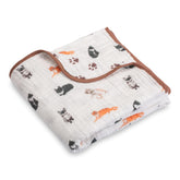 LollyBanks cat-print muslin blanket closeup highlighting soft cozy nursery mood.
