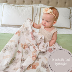LollyBanks muslin swaddle blanket 47x47 opened flat showing wrap size