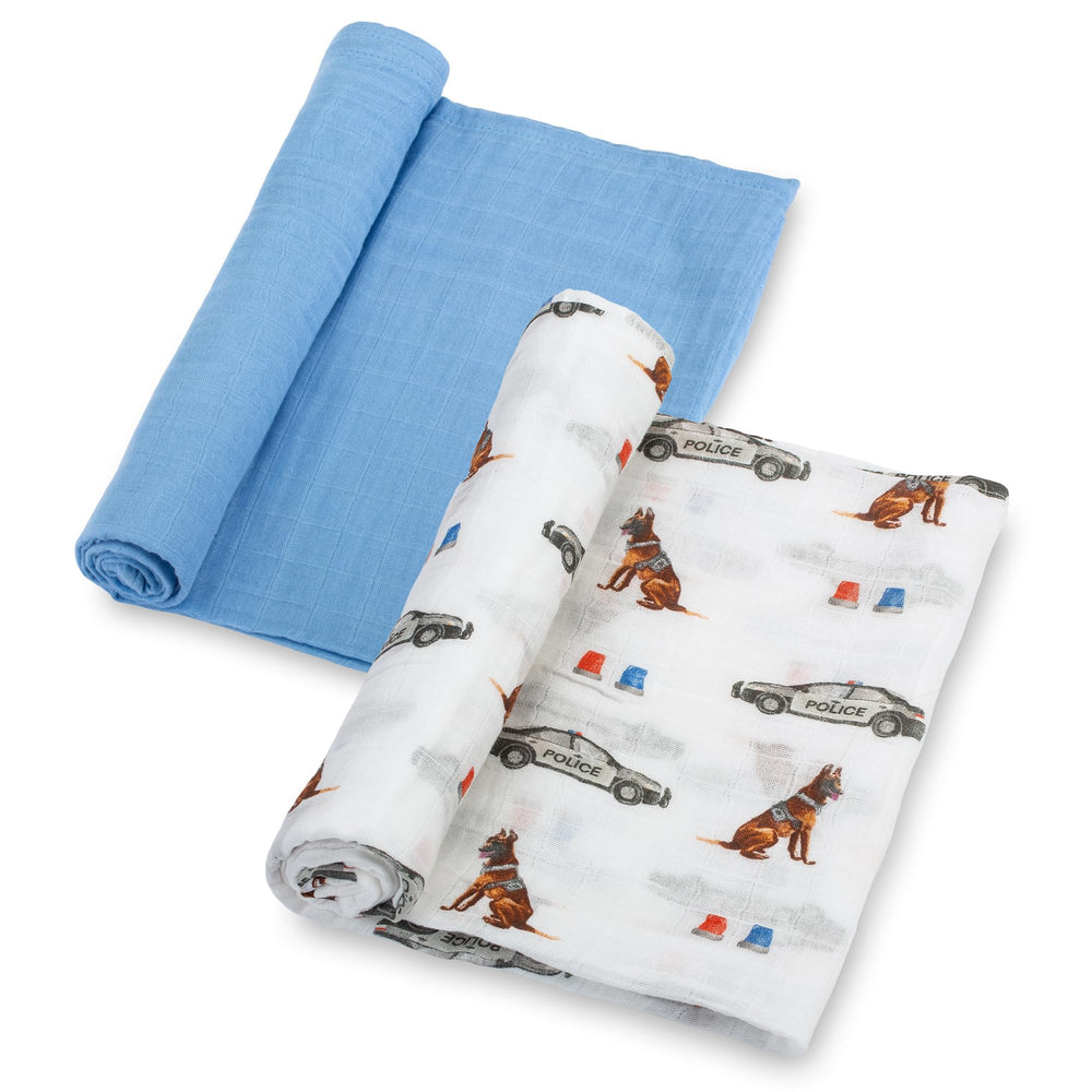 LollyBanks police dog print swaddle in blue, breathable cotton for cozy newborn snuggles.