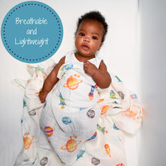 LollyBanks soft cotton muslin swaddle blanket offering gentle newborn comfort.