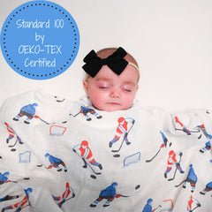 LollyBanks 47x47 swaddle size demonstrates ample space for versatile wrapping.