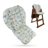 Lomgwumy high chair cushion in green forest pattern shows soft, skin-friendly cotton feel.