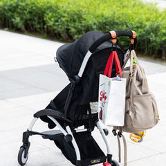Longomat hook shown on bike or cart, demonstrating versatile multi-scene utility