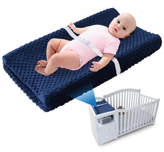 Loonah compact changing pad blue on crib with contoured sides for secure diaper changes.
