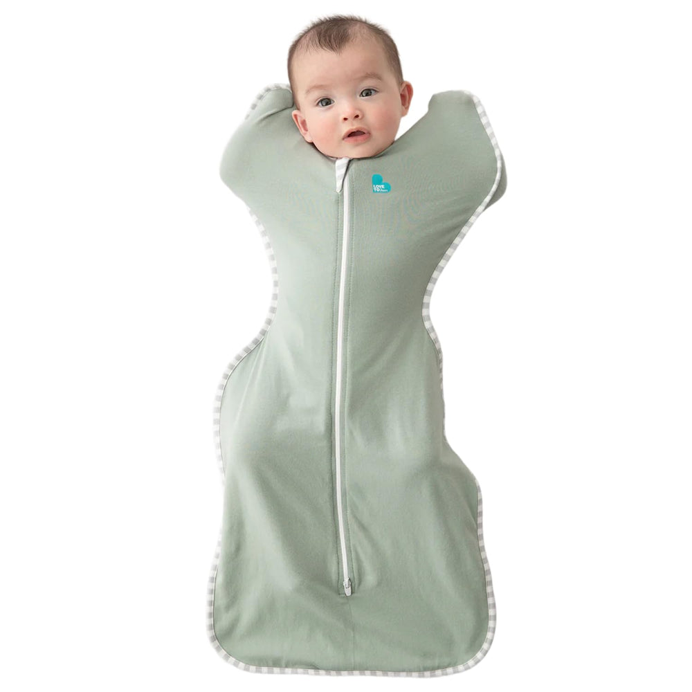 Love to Dream Swaddle Up Olive face close-up suggests cozy self-soothing potential.