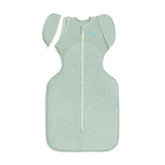 Love to Dream Swaddle Up Transition Bag Olive Twigs front view supports smooth transition sleep.