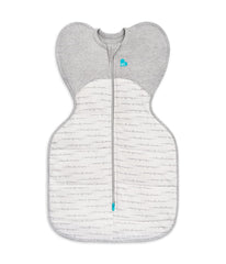 Love to Dream Warm Swaddle Up 2.5 tog newborn sleep sack in arms-up pose for snug comfort