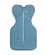 Love To Dream warm Swaddle Up storm blue on baby sleeping with arms up for comfort