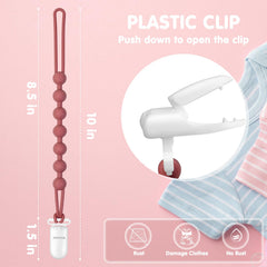 Loviomad pacifier clip features star, moon, sun charms for soothing teething.