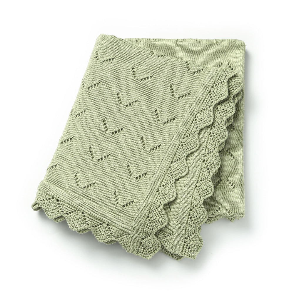 Loyfoky baby blanket knit texture close-up, showcasing ultra-soft cotton gentle on newborn skin.