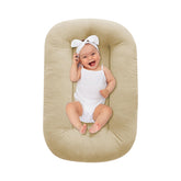 Lucakuins Baby Lounger apricot side view shows breathable organic cotton for safe lounging.