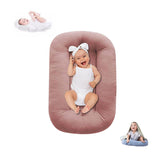 Lucakuins baby lounger in soft organic cotton provides breathable comfort for newborns.