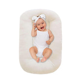 Lucakuins baby lounger white cotton close-up shows soft, breathable fabric for infant comfort.
