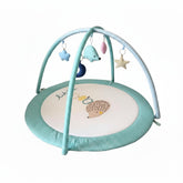 LULLABY COTTON play gym overhead arches provide a soft, safe space for newborn exploration.