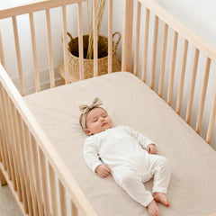 Lulu Moon Muslin crib sheet featuring 9-inch pockets for snug mattress fit