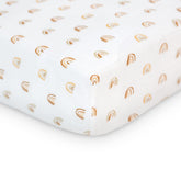 Lulujo Muslin Crib Sheet Rainbows close-up shows soft, breathable fabric for baby comfort.