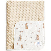 Lulumoon baby blanket with minky dot back and bunny print provides cozy newborn warmth.