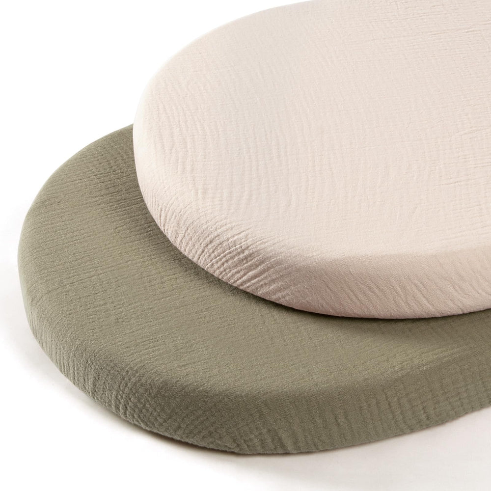 Lulumoon baby muslin bassinet sheets closeup shows soft breathable cotton for gentle sleep.