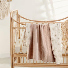 lulumoon crib blanket sand daisy in nursery shot