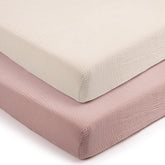Lulumoon fitted pack and play sheets showcase soft muslin for breathable, comfy naps.