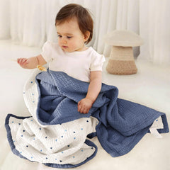 lulumoon Muslin Baby Blanket reversible colors shown for versatile styling.