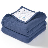 lulumoon Muslin Baby Blanket soft texture closeup for cozy newborn comfort.
