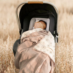 lulumoon muslin blanket sand daisy on stroller during outing