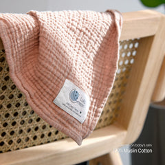 lulumoon Muslin Swaddle Chestnut nursing-cover demonstrates versatile support during feeds