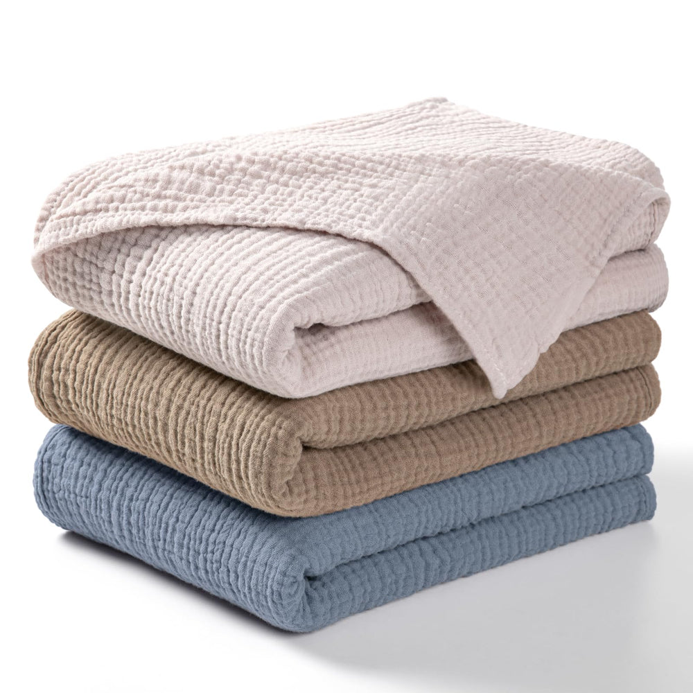 Lulumoon muslin swaddle grey soft-touch blanket for newborn comfort and breathability.