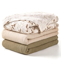 Lulumoon Muslin Swaddle Olive Branches 3-pack provides soft, breathable wrap for newborns.