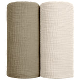 lulumoon muslin swaddle olive folded blanket delivers breathable, skin-friendly comfort for naps.