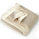 Lulumoon swaddle blanket waffle texture with satin edge for cozy newborn warmth