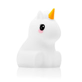 Lumipets Cute Unicorn Night Light on table provides gentle bedtime glow for kids