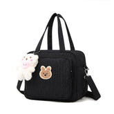 Lushandy diaper bag tote front pocket for quick-access essentials.