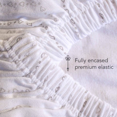 Luvberries Guava Lotus fabric closeup in grey and white—soft, breathable cotton.
