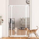 LuxTrsde 55-inch tall dog gate blocks tall jumpers at doorways.