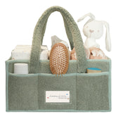 Luxury Little diaper caddy with sherpa exterior offers plush, organized nursery storage for quick changes.
