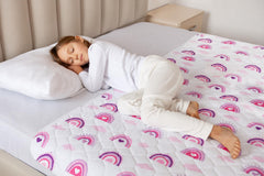 Lynmark Potty Training Mattress Protector rainbow pattern provides kid-friendly comfort during toilet training.