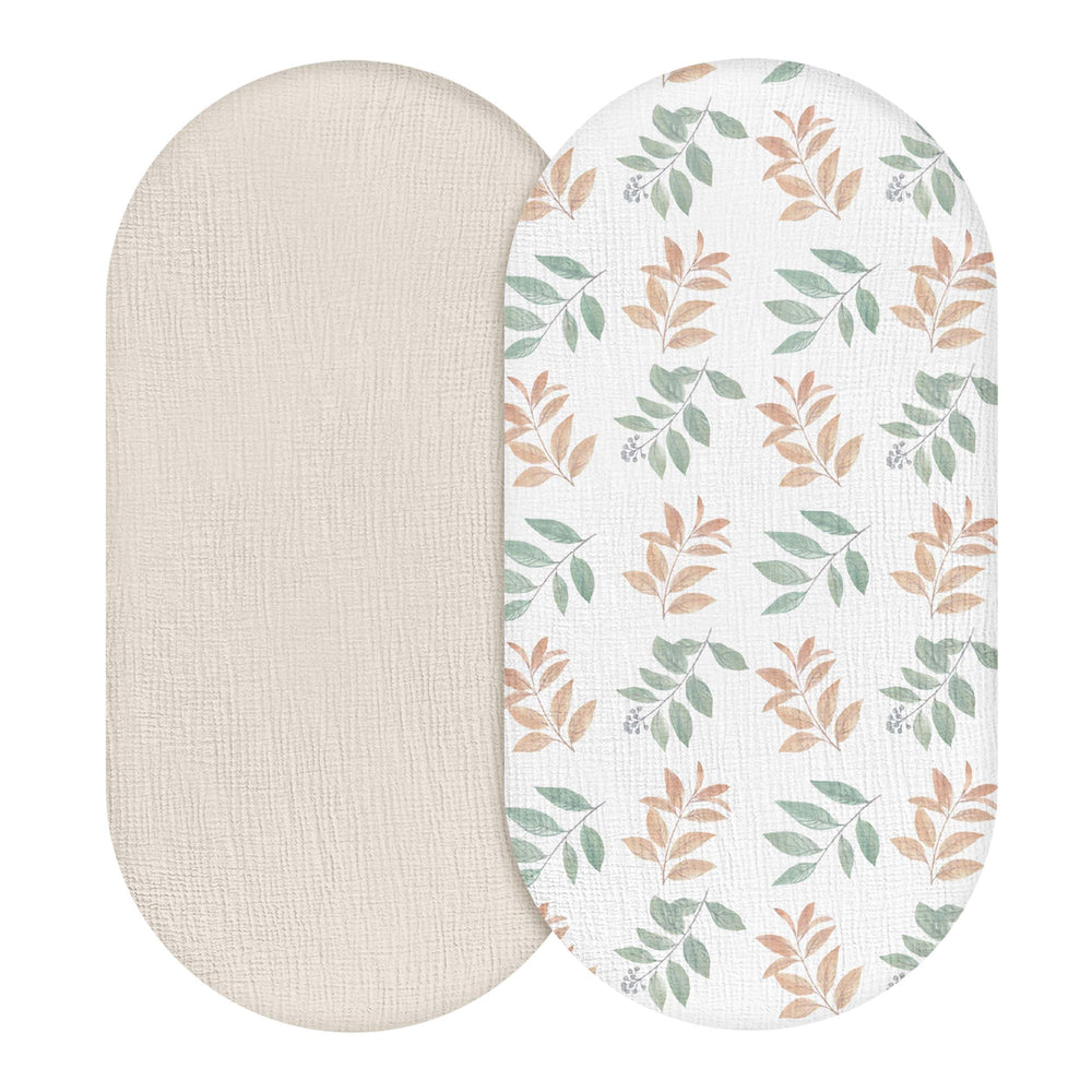LYRICHOM BABY Bright Leaves bassinet sheet folded shows soft breathable cotton for baby's comfort.