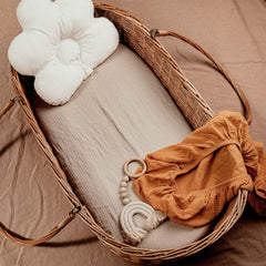LYRICHOM BABY muslin bassinet sheet on mattress showing snug fit