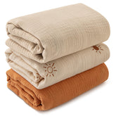 LYRICHOM BABY muslin swaddle blanket folded for quick packing and cozy swaddling