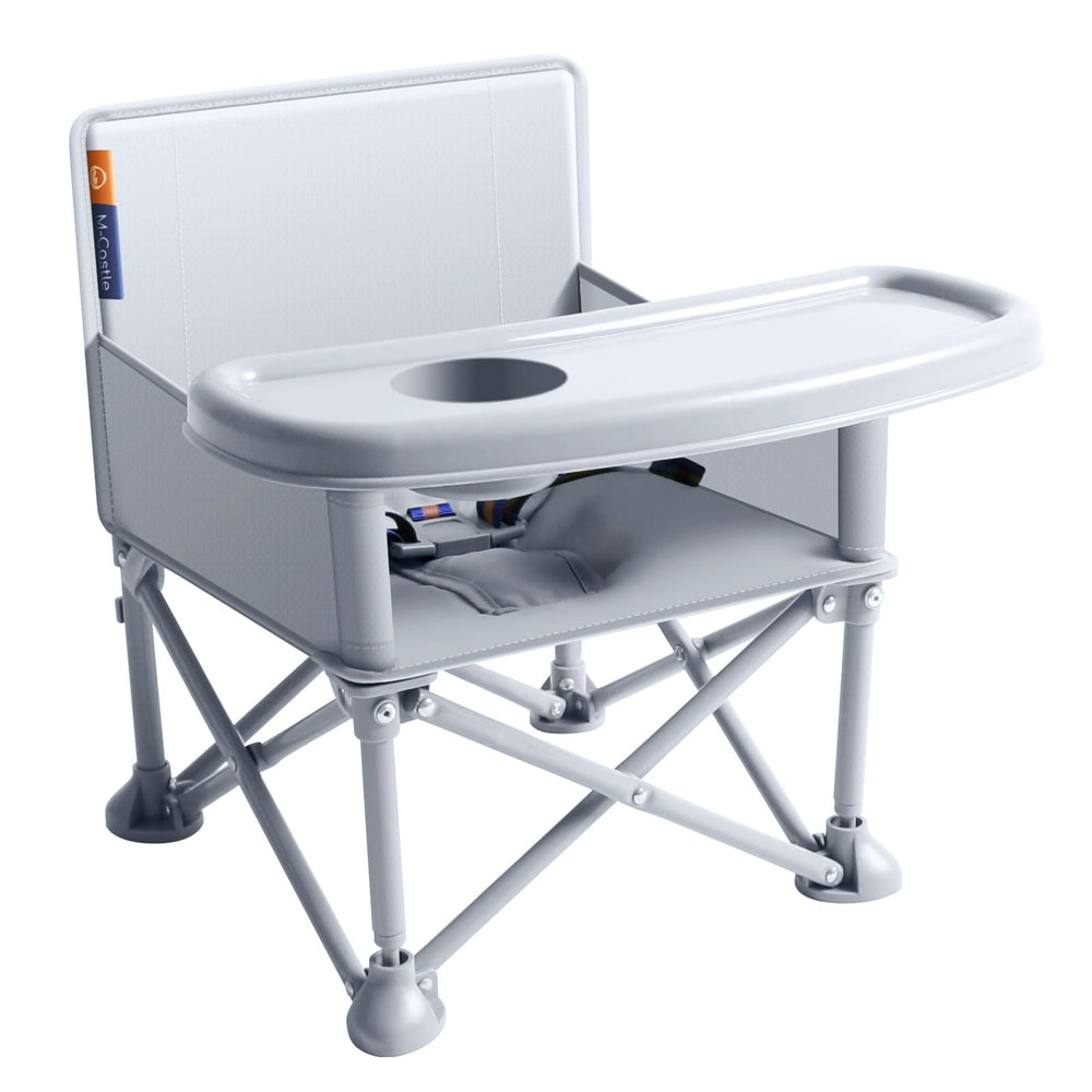 M-Castle travel booster seat with tray extended for on-the-go meals.