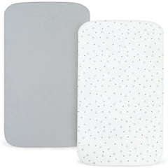 Elastic-edge fitted playard sheets securely wrapping the mattress