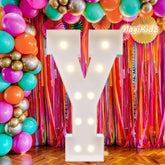 MagiKidz 3ft marquee letter glowing on wall for room decor and nightlight.