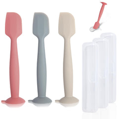 MAIKKB diaper spatula with suction base stands upright for quick access.